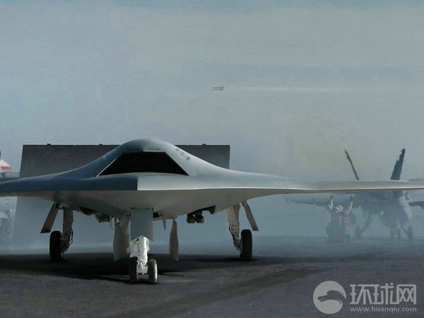 資料圖：X-47B無(wú)人機(jī)在航母上起降想象圖。